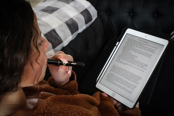 woman reading an ebook purchased online