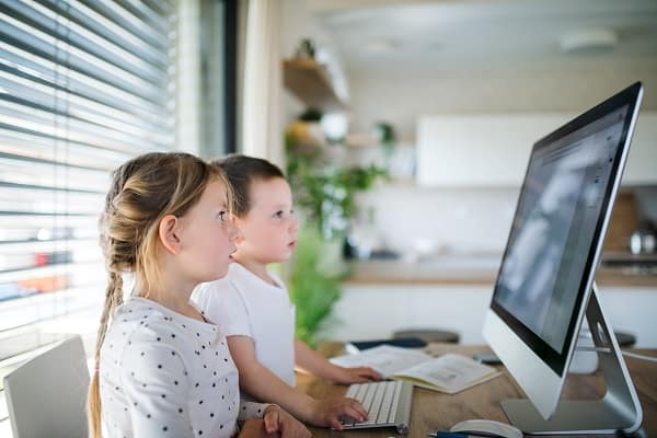 two young people learning online