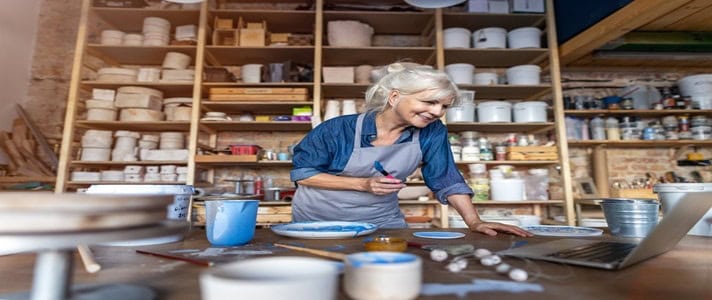 Mature woman pottery artist