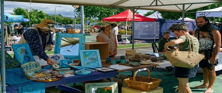 Retiree seller crafts at a market