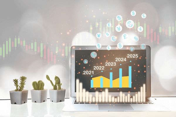 A laptop with a graph showing the future of e-commerce